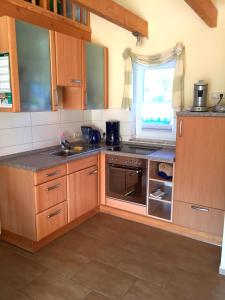 Køkken eller tekøkken på Ferienhaus zwischen den Seen