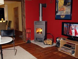 Et tv og/eller underholdning på Ferienwohnung Land Fleesensee