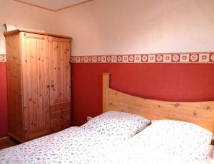 Postel nebo postele na pokoji v ubytování Ferienhaus zwischen den Seen