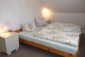 Postel nebo postele na pokoji v ubytování Ferienhaus im Grünen