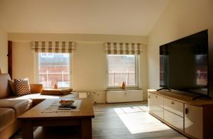 Et tv og/eller underholdning på Moderne FeWo am Malchower See