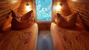 Posezení v ubytování Finnhütte am Lübbesee