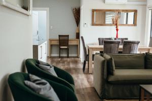 a living room with a couch and a table at Disa Close 3 Cathkin Estates in Winterton +46 photos