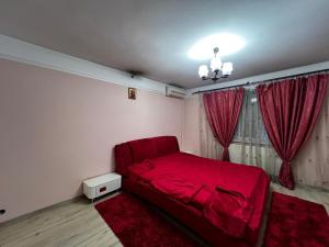 En eller flere senge i et værelse på Ballore SRL