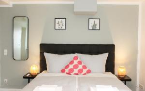 Voodi või voodid majutusasutuse Hotel Palmenbad toas