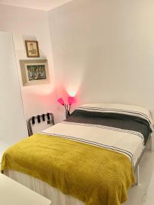 En eller flere senge i et værelse på The Framerys