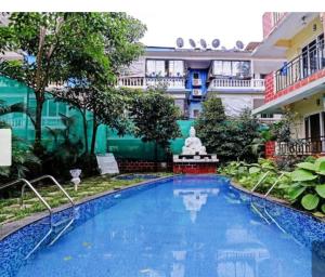 Swimmingpoolen hos eller tæt på Mariners Bay Suites + 4 billeder