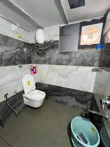 Koupelna v ubytování Sidhi Vinayaka Homestay