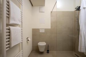 Et badeværelse på GoldenKey Suite am Rathausplatz NEU eingerichtet