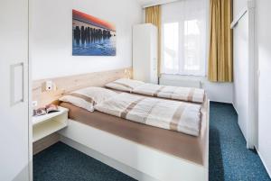 Postel nebo postele na pokoji v ubytování Villa Rosenhof