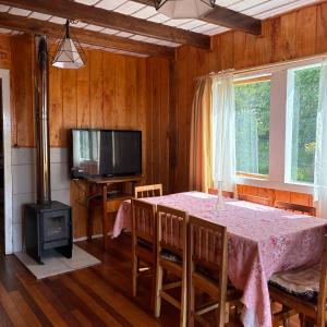 Et tv og/eller underholdning på Cabañas Lago Ranco