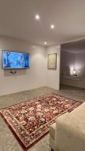 Et tv og/eller underholdning på The Pearls Apartment + 7 billeder