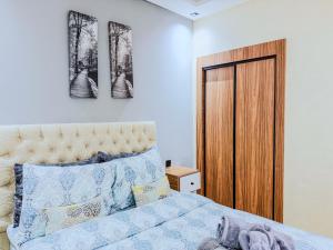 Giường trong phòng chung tại Modern Studio Menara Garden +25 ảnh