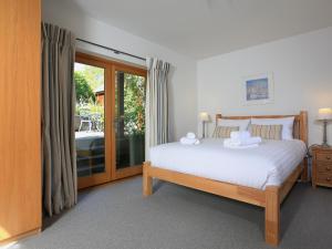 En eller flere senge i et værelse på Courtyard Cottage + 41 billeder