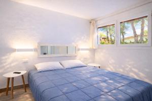 Postel nebo postele na pokoji v ubytování Villa Patrizia