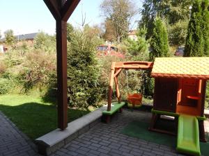 Vonkajšia záhrada v ubytovaní Apartmán Lipno 20