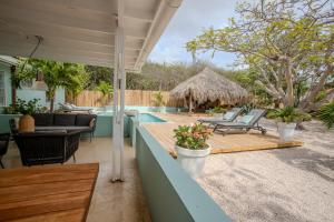 Fotografie z fotogalerie ubytování Paradijselijke villa met prive zwembad, palapa, tropische tuin en rondom privacy v destinaci Grote Berg