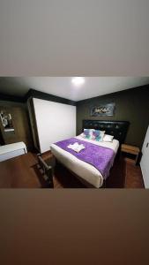 Giường trong phòng chung tại Hotel Gala