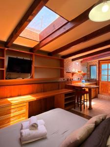 TV a/nebo společenská místnost v ubytování Estero El Claro Hotel y Cabañas