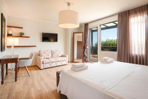 Giường trong phòng chung tại Sunny Exclusive Tria +29 ảnh