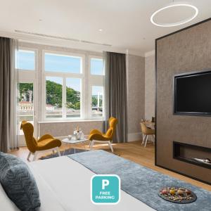 TV a/nebo společenská místnost v ubytování Hotel Vision Budapest by Continental Group