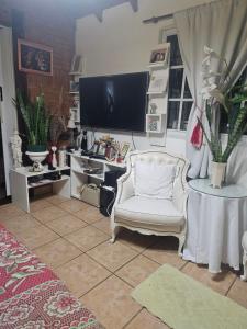 Et opholdsområde på Casa compartida en Munro