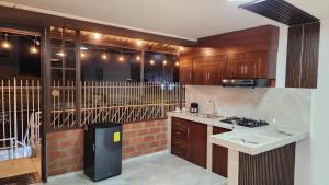 Køkken eller tekøkken på Suits Plaza Jardin + 14 billeder