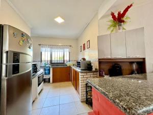 Køkken eller tekøkken på Lindo sobrado para locação + 4 billeder