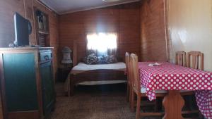 Giường trong phòng chung tại Gitana