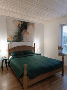 En eller flere senge i et værelse på Pievų Tako kiemelis