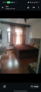 Ένα ή περισσότερα κρεβάτια σε δωμάτιο στο calm nest