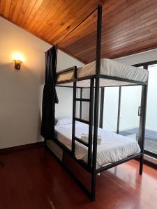 Postel nebo postele na pokoji v ubytování Otro Mundo + 14 fotografií