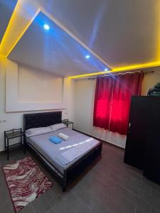 Postel nebo postele na pokoji v ubytování Immeuble Elmo plage Mirleft