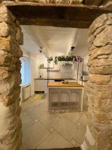 Kuchyň nebo kuchyňský kout v ubytování La Tour des Murmures