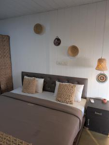 Postel nebo postele na pokoji v ubytování Seaview Stay at Mandrem + 15 fotografií