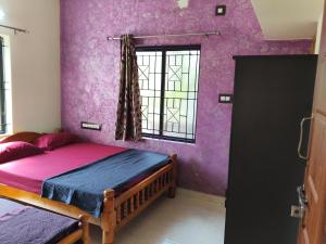 Postel nebo postele na pokoji v ubytování The Homely Stay - Chandransh Homestay