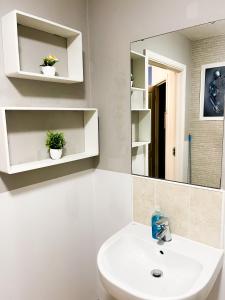 Et badeværelse på Urban Blue En-suite