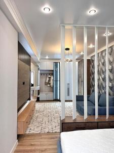 En eller flere senge i et værelse på Bish 70