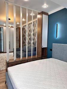 En eller flere senge i et værelse på Bish 70