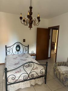 En eller flere senge i et værelse på La Viola Toscana + 12 billeder