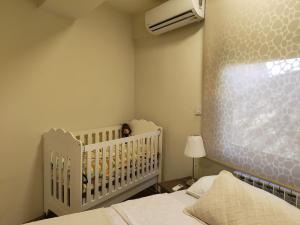 Ένα ή περισσότερα κρεβάτια σε δωμάτιο στο Urban Vibe Apartments 2