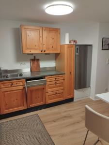 Kuchyň nebo kuchyňský kout v ubytování Ferienhaus Tauber Lodge für Familie & Freunde + 7 fotografií