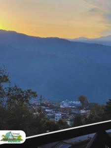 a view of a city and a body of water at Chalet Maranatha Vista Única Represa de Chivor in Macanal