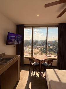 Телевізор і / або розважальний центр в Balam Suites +230 фото