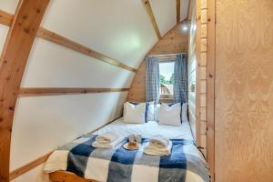 a bedroom with a bed with towels on it at 1 Bed in Northrepps oc-f32562 in Cromer +54 photos