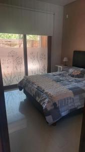 En eller flere senge i et værelse på dpto SanLuis