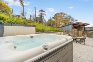 a hot tub in a yard with a patio at 1 Bed in Montgomery oc-w33744 in Montgomery