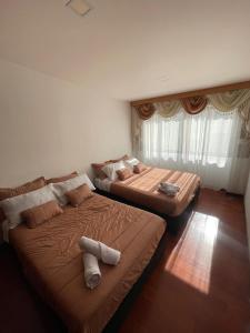 Postel nebo postele na pokoji v ubytování Otro Mundo