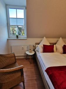 En eller flere senge i et værelse på Domizil Am Stadtzentrum + 6 billeder