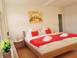 En eller flere senge i et værelse på Domizil Am Stadtzentrum